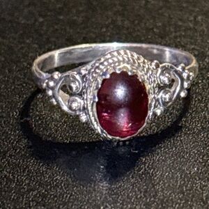 Elegant Silver and Red Gemstone Ring